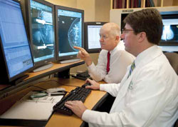 photo of doctors reading breast screen images
